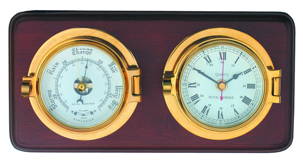 meridian zero channel range brass clock and barometer mounted on a wooden board